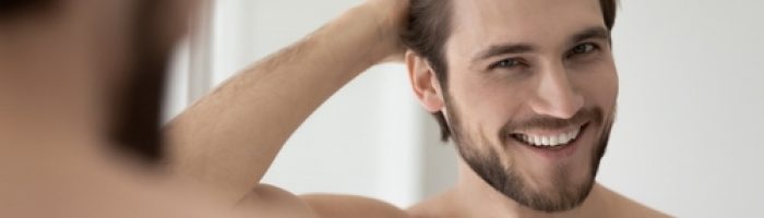 Happy,Attractive,Young,Guy,Touching,Smooth,Silky,Hair,,Looking,At